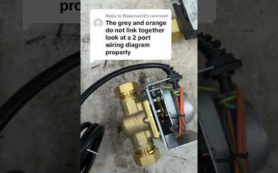 An electrician telling a plumber how to wire an S plan heating system ￼